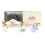 Three Beswick Beatrix Potter figures, comprising Peter Rabbit, Cotton Tail, and Mrs Rabbit, together