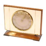 A Smith's 1950's electric mantel clock, the rectangular clock plate with copper coloured mirrored gl