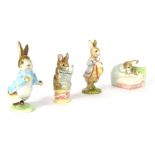 Four Beswick Beatrix Potter figures, comprising Peter in bed, 1994, Peter with post bag, 1996, Tailo