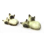 Two Beswick Siamese Cat groups, one stamped No 1296, the other stamped Beswick England black back st