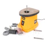 A Triton oscillating spindle sander, 450W, with additional sanding belts.