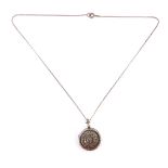 A silver and marcasite locket pendant and chain, the circular locket stamped DMP, with star marcasit