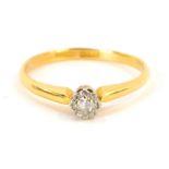 A 22ct gold diamond solitaire ring, the illusion set round brilliant cut diamond in a platinum setti