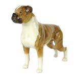 A Beswick Boxer dog, with striped back, in running pose, 14cm high, boxed.