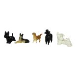 Five Beswick dog ornaments, comprising Retriever, Alsatian, Scottie, Poodle and a white Scottie with