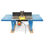 A Work Zone router table, with clamp attachment, lacking router.