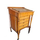 A Victorian oak clerk's desk, with galleried top with slope revealing desk top with the retailer's