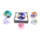 Six Caithness glass paperweights, comprising Pebble (x2), Glamis Rose limited edition, 65/500, Brims