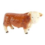 A Melba Ware figure of a bull, 17cm high.