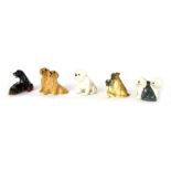 Five Beswick dog ornaments, comprising The Dog Groups, Bulldog, pair of Rottweilers, pair of Golden