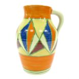 A reproduction painted water jug, in the style of Clarice Cliff, in classic orange, blue, yellow and