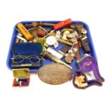 Trinkets and effects, a National Engineers brass badge, cased pipe, collector's coins, Bakelite page