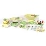 A group of Carltonware, comprising leaf pin dishes, salad bowl and servers, toast rack, milk jug, et