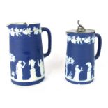 A pair of late 19thC/early 20thC Wedgwood blue Jasperware, comprising two jugs, each with pewter top