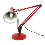 A red Anglepoise desk lamp, 94cm high fully extended.