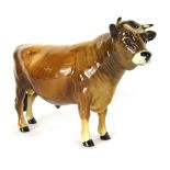 A Beswick Jersey Bull Champion Dunsley Coy Boy, 11cm high, boxed.