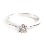 A 9ct white gold diamond solitaire ring, with round brilliant cut diamond approx 0.15cts, in four cl