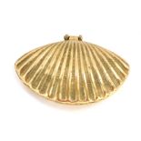 A brass scallop shell dish, the hinged two section shell opening to reveal a domed interior, 13cm di