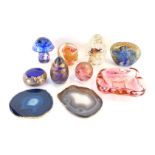 A group of Isle of Wight glass paperweights, a glass mushroom and two agate geodes. (1 tray)