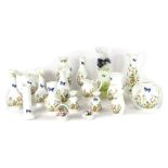 A group of Aynsley Cottage Garden china, comprising vases, ornaments and posy dishes, large flared b