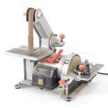 A Nixon belt sander, model BD150BQ, with additional belts.