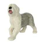 A Beswick Old English Sheep Dog model, in running pose, J88, with Beswick England, stamped to unders