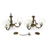 Two three branch chandeliers, each with brass fittings with glass floral shades, 30cm high.