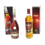 A Grants Family Reserve Scotch Whiskey 70cl bottle, and a Remy Martin Champagne Cognac, boxed. (2)