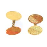 A pair of 18ct gold cuff links, each with oval engine turned decorated links, and chain links, 2cm w