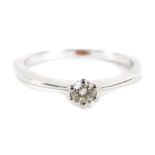 A 9ct white gold diamond solitaire ring, set with round brilliant cut diamond approx 0.15cts, in six