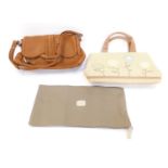 Two Radley lady's handbags, comprising a brown leather and autumnal leaf design lined handbag, toget