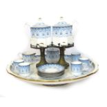A Wedgwood Tete-a-Tete tea service, with a large rotating blue and white platter, five cups and sauc