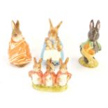 Four Beswick Beatrix Potter figure groups, comprising Mrs Rabbit and Bunnies, Little Black Rabbit, F