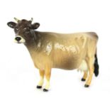 A Beswick Jersey Cow Champion Newton Tinkle, 10cm high, boxed.