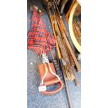 A group of wooden shafted golf clubs, shooting stick, brass stair rods, etc. (a quantity)