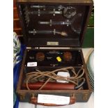 A Reedson high frequency medical set, with Harrods Limited stamp, in leather carry case. (AF)