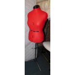 A modern height adjustable mannequin.