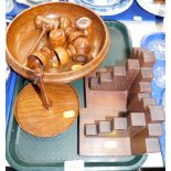A group of turned wooden items, gavel, fruit bowl, egg cups, pair of modern book ends, etc. (1 tray)