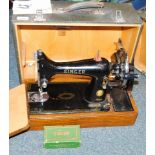 A cased Singer Sewing machine serial no. EK426379.