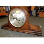 An oak Nelson's hat mantel clock.