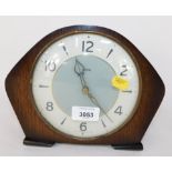 A Smiths 1950s Art Deco style mantel clock, with a white and grey dial, with gold hands.