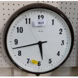 A Smiths Bakelite cased wall clock, with eight day movement. (AF)