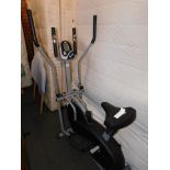 An XS Sports exercise bike and combined cross trainer.