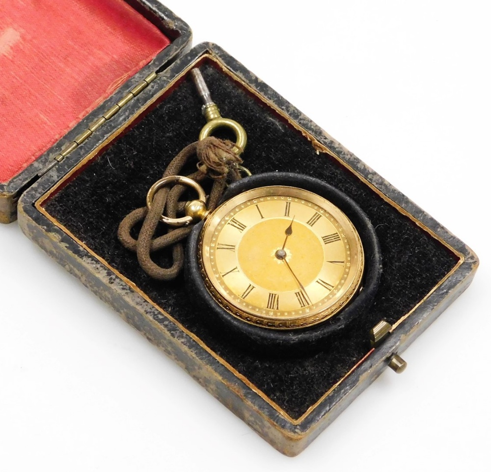 An 18ct gold pocket watch, with a floral hammered dial, and Roman numeric outer dial with black hand
