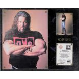 A World Championship Wrestling collector's plaque, signed by Kevin Nash, with certificate, faux marb