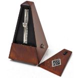A Wittner metronome, 22cm high.