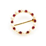A ruby and pearl circular brooch, with arrangement of cultured pearls and round brilliant cut rubies