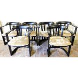 A set of six Knoll ebonised carver chairs, with loop backs, and faux skin seats.