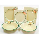 A group of Clarice Cliff Bizarre Ravel pattern wares, comprising two octagonal fruit bowls, 23cm wid