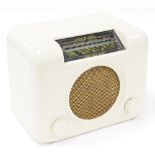 A Bush radio mains receiver, in cream, type DAC90A, 26cm high, 29cm wide.